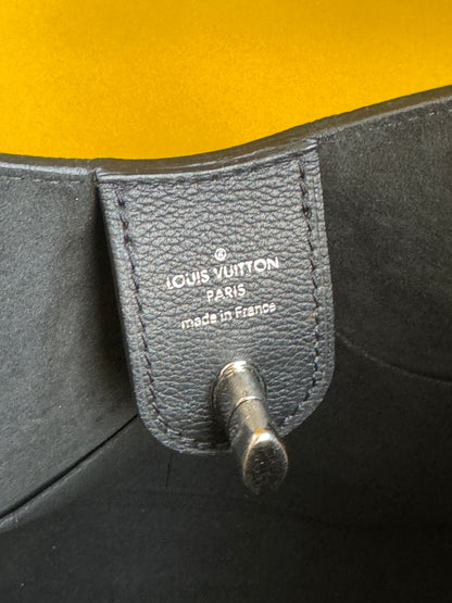 Louis Vuitton Lockme Handbag